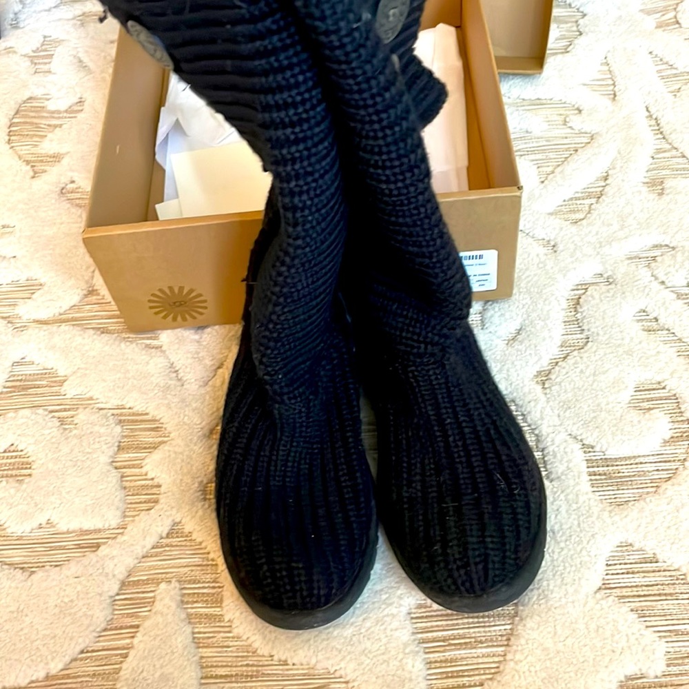 Black sweater UGG boots